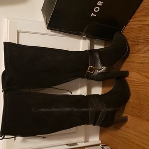 Never worn. 8W Black knee high suede boots. 4 inch heel.  Originally $112
